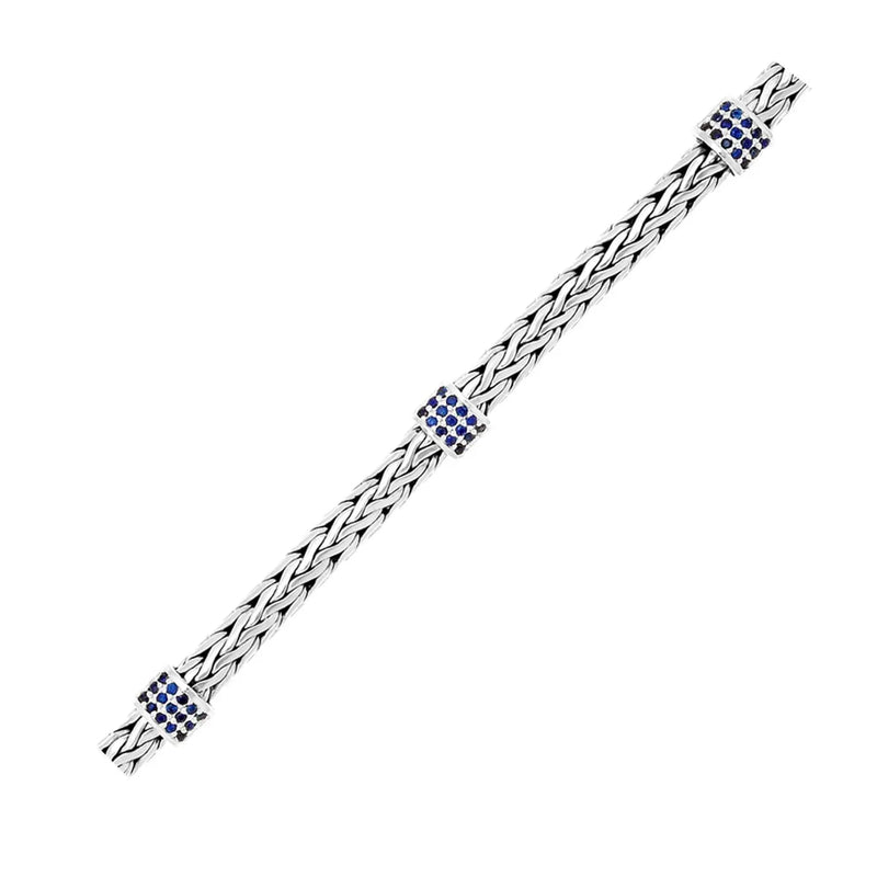 An image displaying Sterling Silver Woven Bracelet with Blue Sapphire Stations by Orca Market
