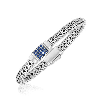 An image displaying Sterling Silver Weave Motif Bracelet with Blue Sapphire Embellishments by Orca Market