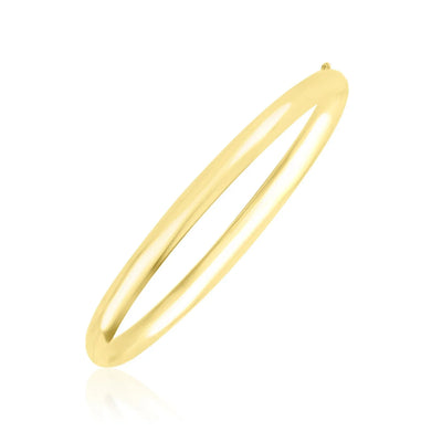 An image displaying 10k Yellow Gold Dome Style Shiny Bangle by Orca Market