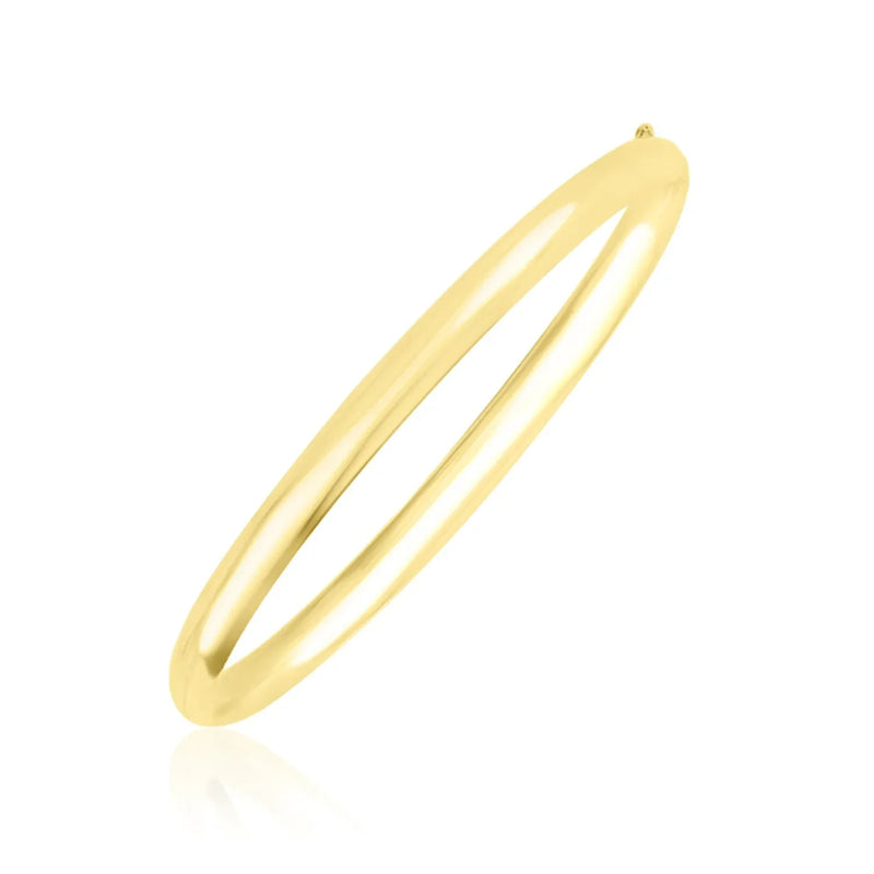 An image displaying 10k Yellow Gold Dome Style Shiny Bangle by Orca Market