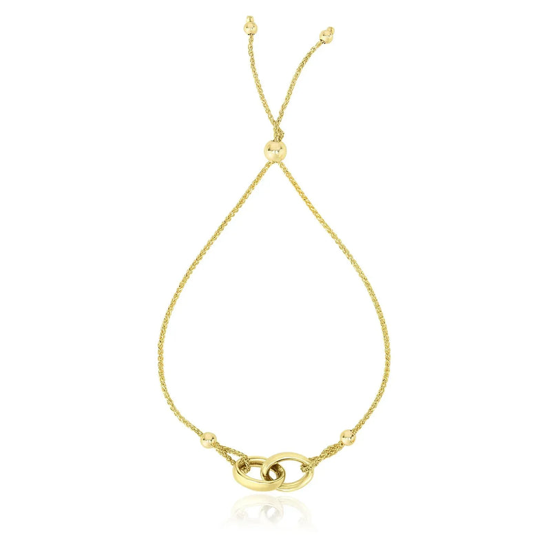 An image displaying 14k Yellow Gold Entwined Rings Adjustable Lariat Style Bracelet by Orca Market