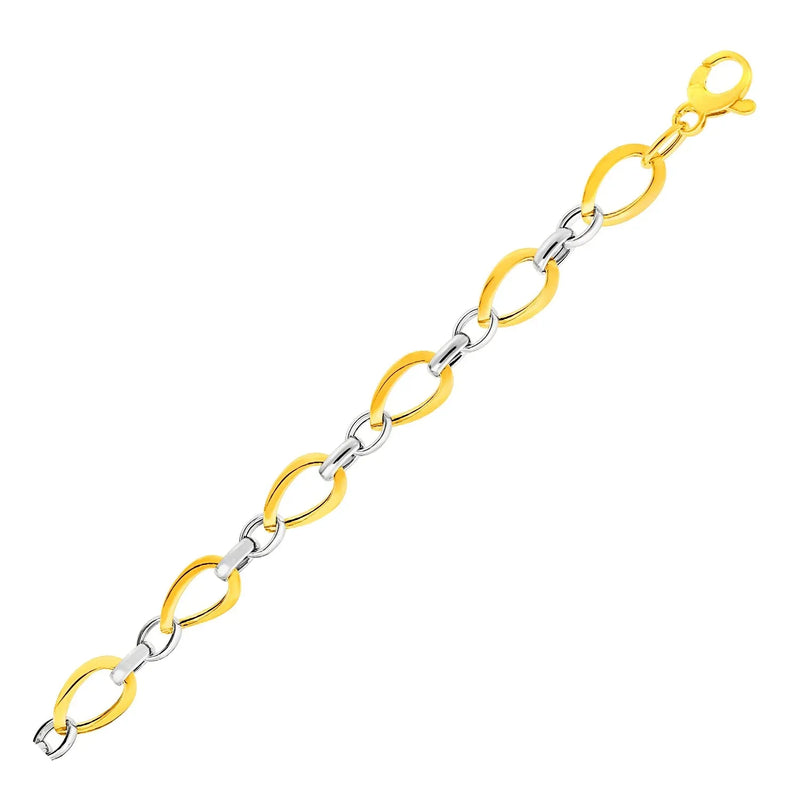 An image displaying Twisted Oval Chain Bracelet in 14k Two Tone Gold by Orca Market