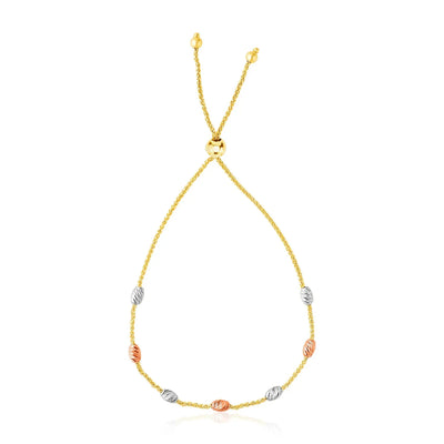 An image displaying 14k Tri-Color Gold Textured Oval Station Lariat Style Bracelet by Orca Market