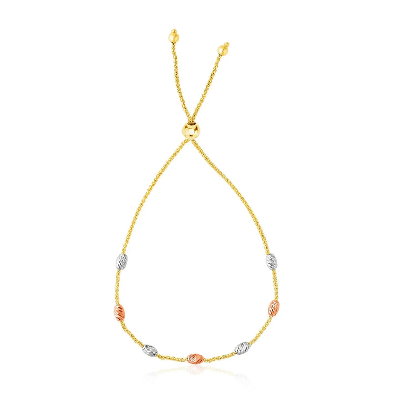 An image displaying 14k Tri-Color Gold Textured Oval Station Lariat Style Bracelet by Orca Market