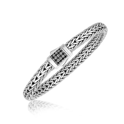 An image displaying Sterling Silver Braided Style Men's Bracelet with Black Sapphire Accents by Orca Market