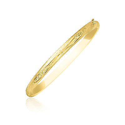 An image displaying 10k Yellow Gold Botanical Pattern Florentine Bangle by Orca Market