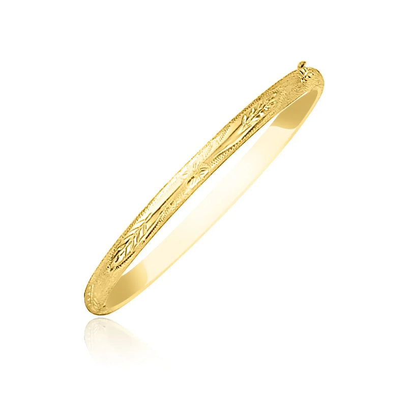 An image displaying 10k Yellow Gold Botanical Pattern Florentine Bangle by Orca Market