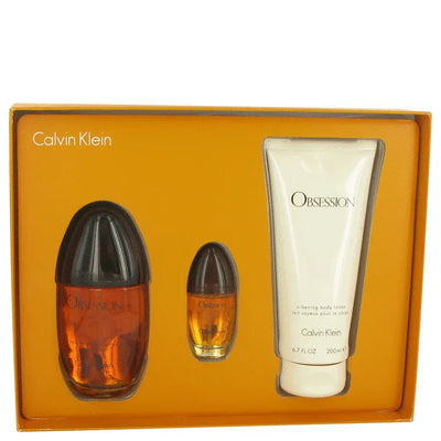 An image displaying Obsession by Calvin Klein Gift Set -- 3.4 oz Eau De Parfum Spray + 6.7 oz Body Lotion + .5 oz Mini EDP Spray for Women by Calvin Klein