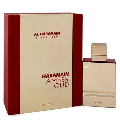 An image displaying Al Haramain Amber Oud Rouge by Al Haramain Eau De Parfum Spray 2 oz for Men by Al Haramain