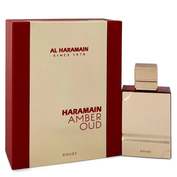 An image displaying Al Haramain Amber Oud Rouge by Al Haramain Eau De Parfum Spray 2 oz for Men by Al Haramain