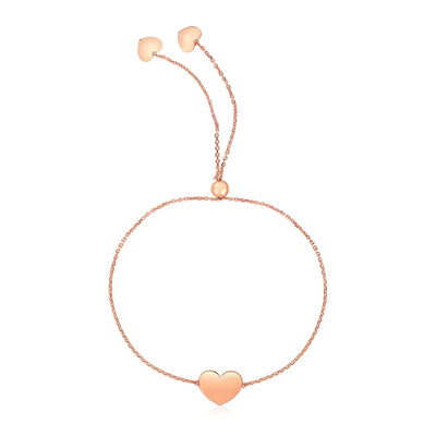 An image displaying 14k Rose Gold Adjustable Heart Bracelet by Orca Market