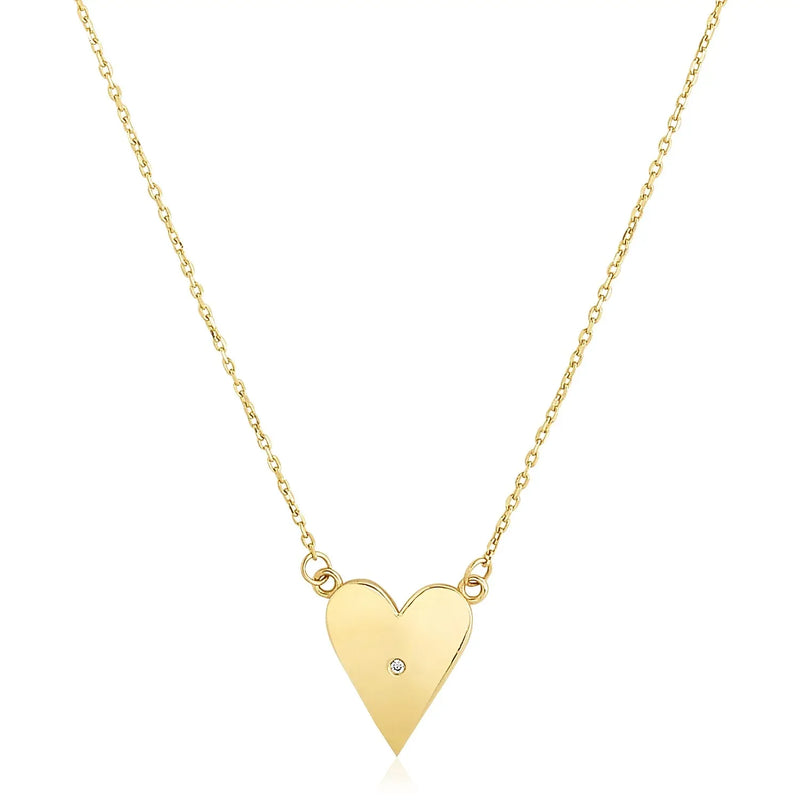 An image displaying 14k Yellow Gold High Polish Elongated Heart Necklace by Orca Market