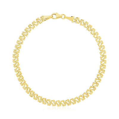 An image displaying 14k Yellow Gold High Polish Textured Fancy Chain Bracelet (4mm) by Orca Market