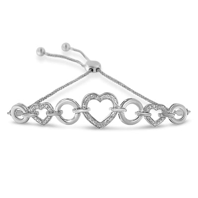 An image displaying .925 Sterling Silver 1/10 Cttw Round-Cut Diamond Heart-Link Adjustable Bolo Bracelet ( H-I Color, I2-I3 Clarity) - 6"-9" Adjustable by Infinite Jewels