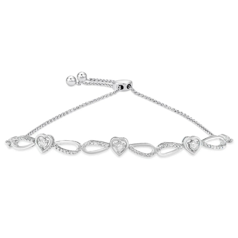 An image displaying .925 Sterling Silver Diamond Accent Heart and Infinity 4”-10” Adjustable Bolo Bracelet (I-J Color, I3 Clarity) by Infinite Jewels