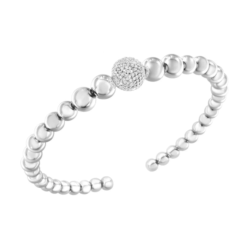An image displaying .925 Sterling Silver 1/6 Cttw Diamond Rondelle Graduated Ball Bead Cuff Bangle Bracelet (I-J color, I2-I3 clarity) - Fits wrists up to 7 1/2 inches by Infinite Jewels