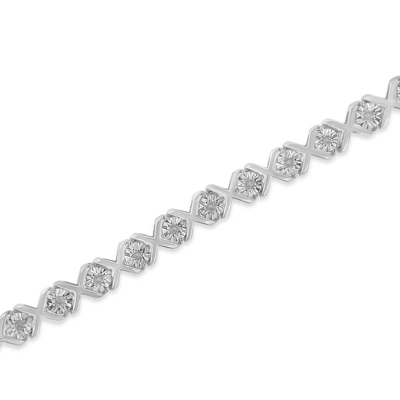 An image displaying .925 Sterling Silver 1/10 cttw Miracle-Set Round-Cut Diamond "X" Link Tennis Bracelet (I-J color, I2-I3 clarity) - 7.25" by Infinite Jewels