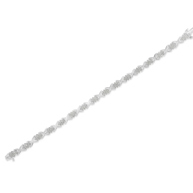 An image displaying .925 Sterling Silver 1-1/2 Cttw Diamond Cluster X Link 7" Tennis Bracelet (I-J color, I3 clarity) by Infinite Jewels