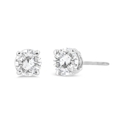 An image displaying 14K White Gold 3/4 Cttw Lab Grown Diamond 4-Prong Classic Stud Earrings (F-G Color, VS2-SI1 Clarity) by Infinite Jewels