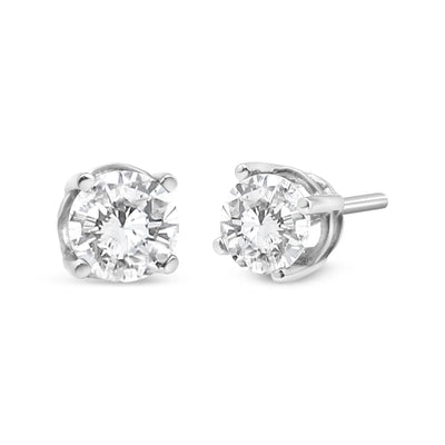 An image displaying 14K White Gold 3/4 Cttw Lab Grown Diamond 4-Prong Classic Stud Earrings (F-G Color, VS2-SI1 Clarity) by Infinite Jewels