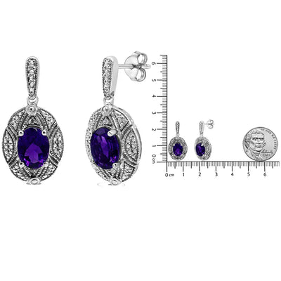 An image displaying .925 Sterling Silver Diamond Accent and 8x6mm Purple Oval Amethyst Stud Earrings (I-J Color, I1-I2 Clarity) by Infinite Jewels