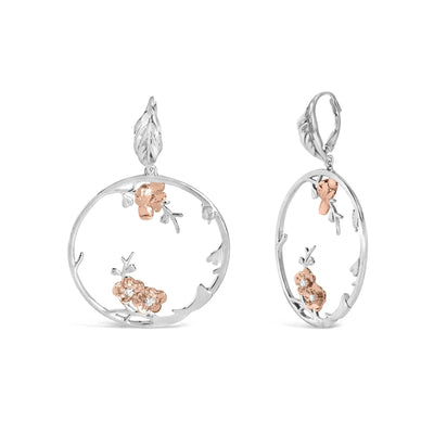 An image displaying Rose Gold Plated .925 Sterling Silver 1/10 Cttw Diamond Floral Hoop Earrings (I-J Color, SI1-SI2 Clarity) by Infinite Jewels