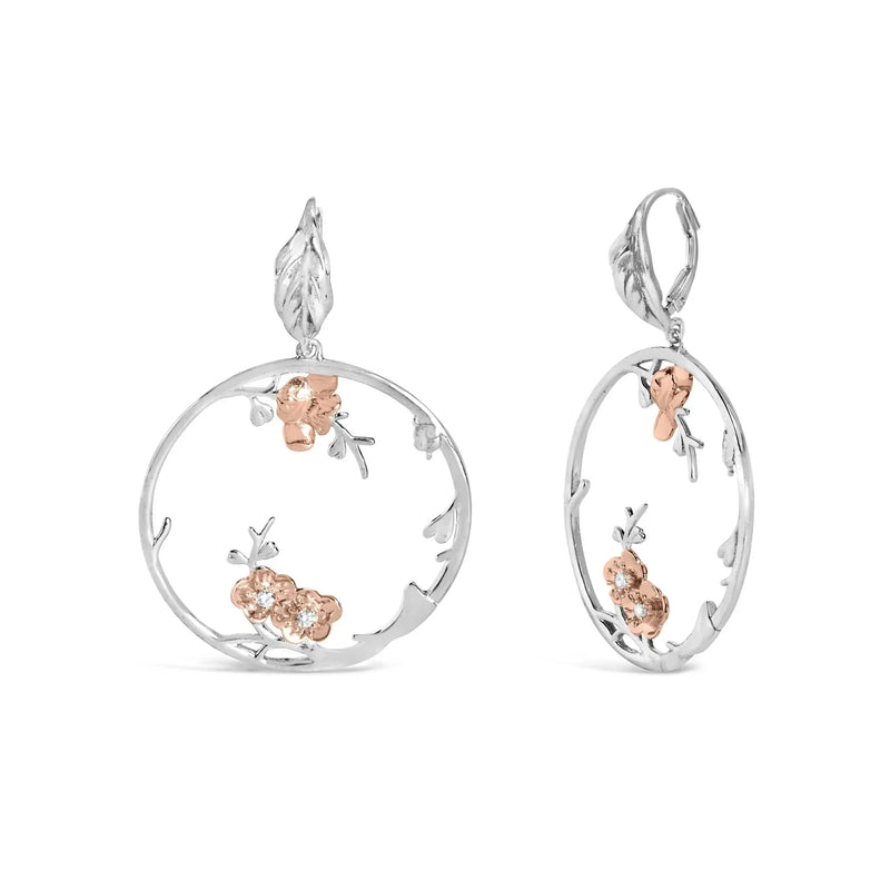 An image displaying Rose Gold Plated .925 Sterling Silver 1/10 Cttw Diamond Floral Hoop Earrings (I-J Color, SI1-SI2 Clarity) by Infinite Jewels