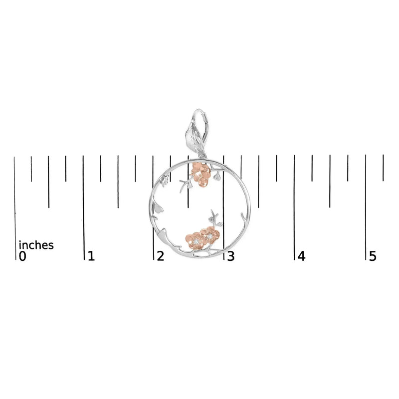 An image displaying Rose Gold Plated .925 Sterling Silver 1/10 Cttw Diamond Floral Hoop Earrings (I-J Color, SI1-SI2 Clarity) by Infinite Jewels