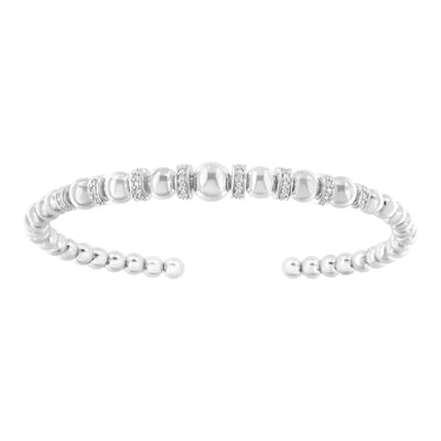An image displaying .925 Sterling Silver 1/4 Cttw Diamond Rondelle Graduated Ball Bead Cuff Bangle Bracelet (I-J color, I2-I3 clarity) - Fits wrists up to 7 1/2 inches by Infinite Jewels