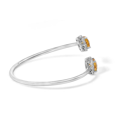 An image displaying .925 Sterling Silver 8mm Cushion Cut Yellow Citrine Gemstone and Diamond Accent Split Bypass Bangle Bracelet (H-I Color, SI1-SI2 Clarity) - Fits up to 7.75" Inches by Infinite Jewels