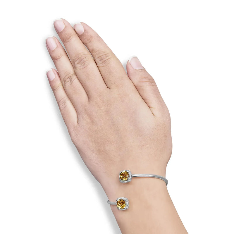 An image displaying .925 Sterling Silver 8mm Cushion Cut Yellow Citrine Gemstone and Diamond Accent Split Bypass Bangle Bracelet (H-I Color, SI1-SI2 Clarity) - Fits up to 7.75" Inches by Infinite Jewels