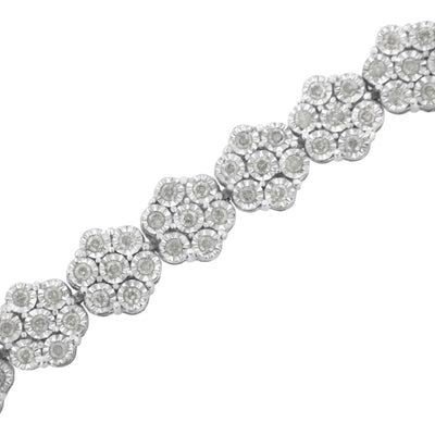 An image displaying .925 Sterling Silver 2.0 cttw Diamond 7 Stone Floral Cluster Link Bracelet (I-J Color, I3 Clarity) -7.25" by Infinite Jewels