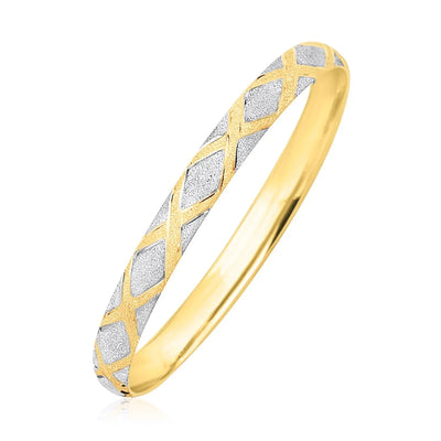 An image displaying 10k Two-Tone Gold Geometric Diamond Motif Bangle by Orca Market