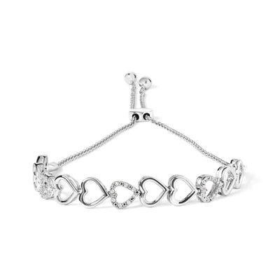 An image displaying .925 Sterling Silver 1/10 Cttw Diamond Heart Link Bolo Bracelet (I-J Color, I2-I3 Clarity) by Infinite Jewels