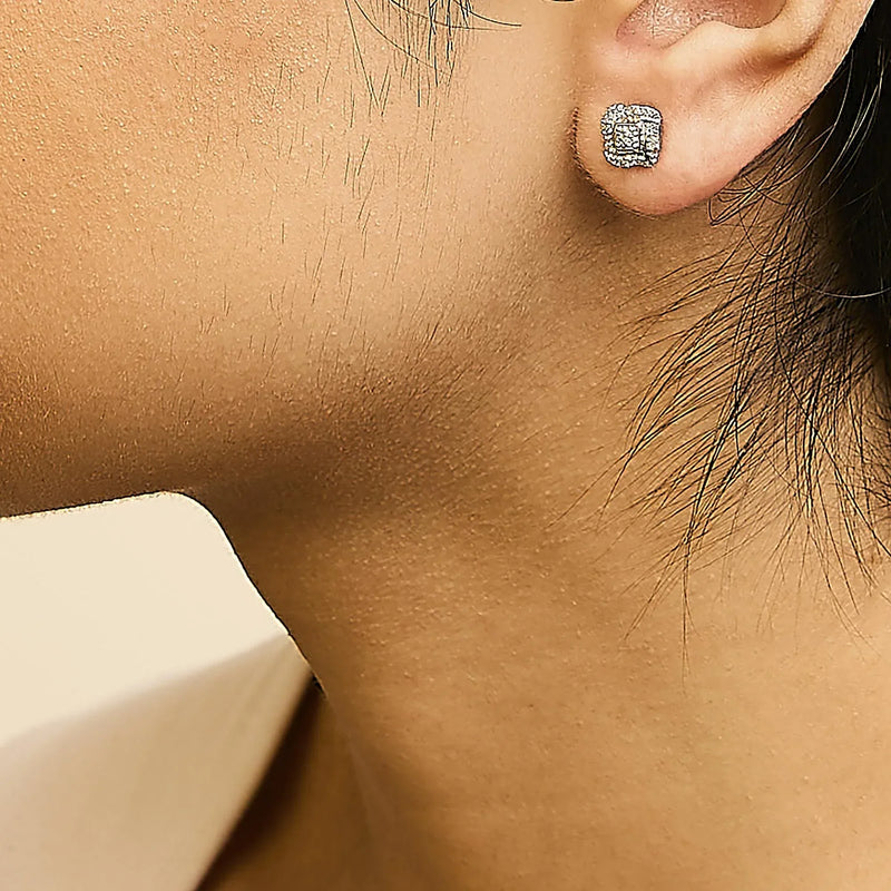 An image displaying Sterling Silver Round Cut Diamond Square Stud Earrings (0.04 cttw, H-I Color, I2-I3 Clarity) by Infinite Jewels