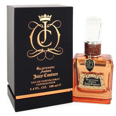 An image displaying Juicy Couture Glistening Amber by Juicy Couture Eau De Parfum Spray 3.4 oz for Women by Juicy Couture