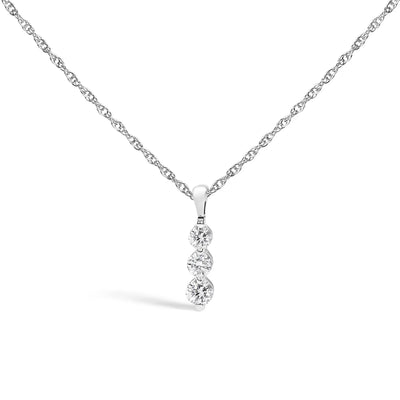 An image displaying .925 Sterling Silver 1/7 Cttw Lab Grown Diamond Three Stone Diamond Pendant Necklace - 18" Inches by Infinite Jewels