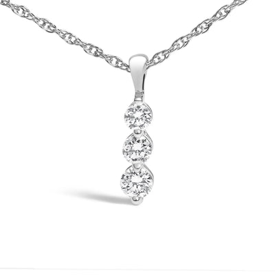 An image displaying .925 Sterling Silver 1/7 Cttw Lab Grown Diamond Three Stone Diamond Pendant Necklace - 18" Inches by Infinite Jewels