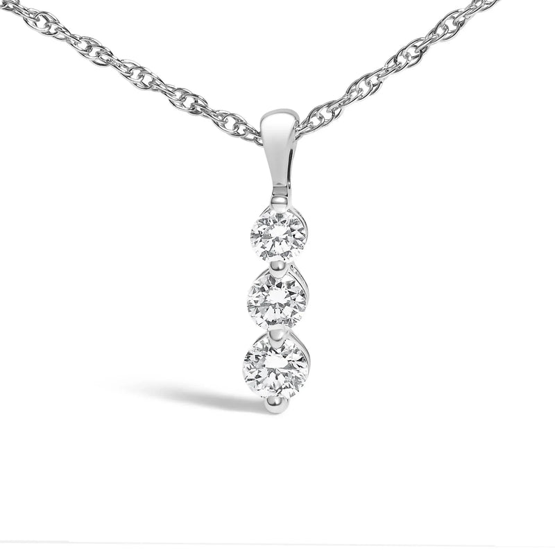 An image displaying .925 Sterling Silver 1/7 Cttw Lab Grown Diamond Three Stone Diamond Pendant Necklace - 18" Inches by Infinite Jewels