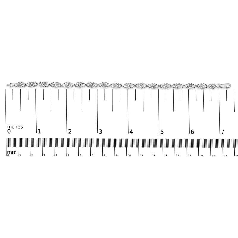 An image displaying .925 Sterling Silver Diamond Accent Heart Link Bracelet (I-J Color, I3 Clarity) - 7.25" by Infinite Jewels