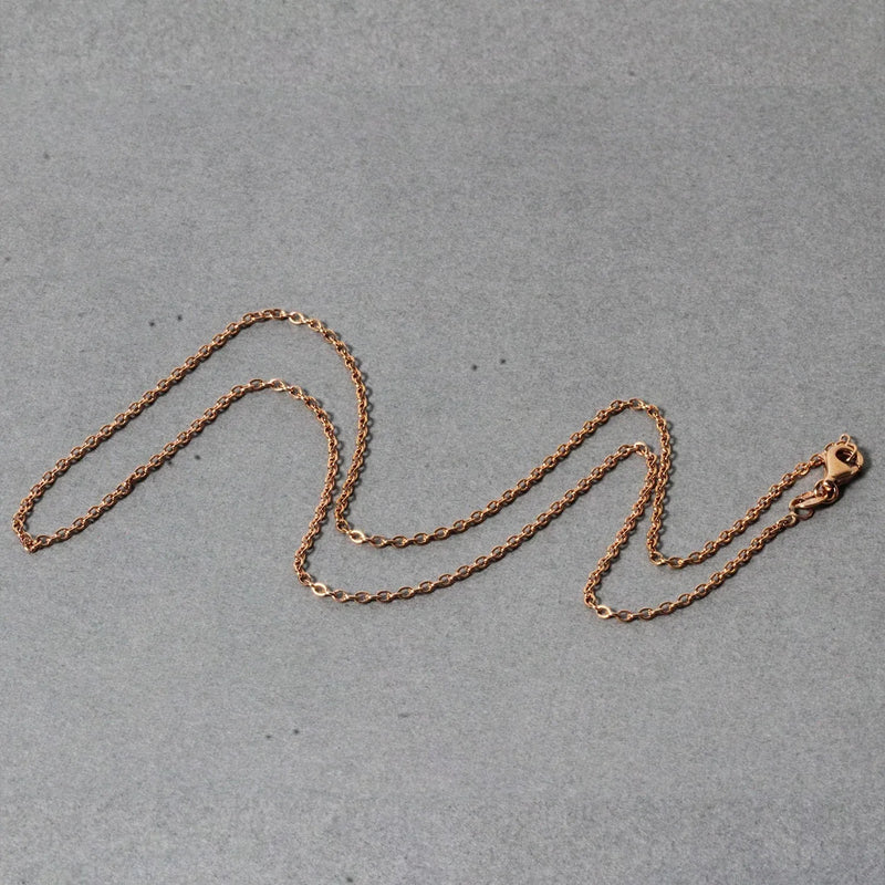 An image displaying 14k Rose Gold Round Cable Link Chain 1.5mm by Orca Market
