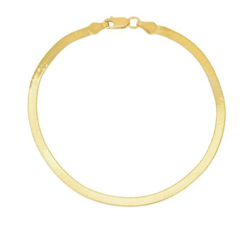 An image displaying 1.5mm 14k Yellow Gold Super Flex Herringbone Anklet by Orca Market