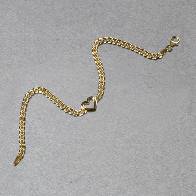 An image displaying 14k Yellow Gold 7 inch Curb Chain Bracelet with Heart by Orca Market