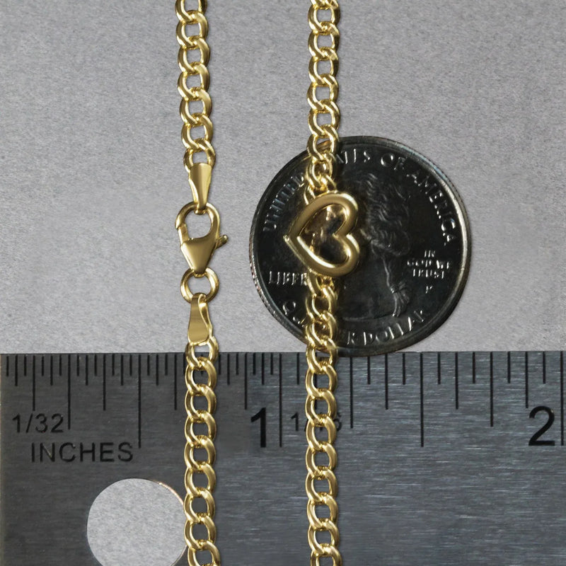 An image displaying 14k Yellow Gold 7 inch Curb Chain Bracelet with Heart by Orca Market