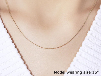 An image displaying 10k Yellow Gold Cable Link Chain 0.5mm by Orca Market