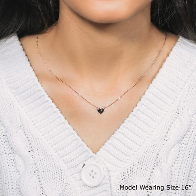 An image displaying 14k Rose Gold Polished Mini Heart Necklace by Orca Market