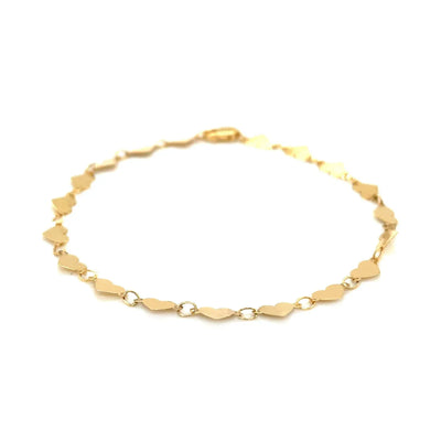 An image displaying 14k Yellow Gold 7 inch Mirrored Heart Chain Bracelet by Orca Market