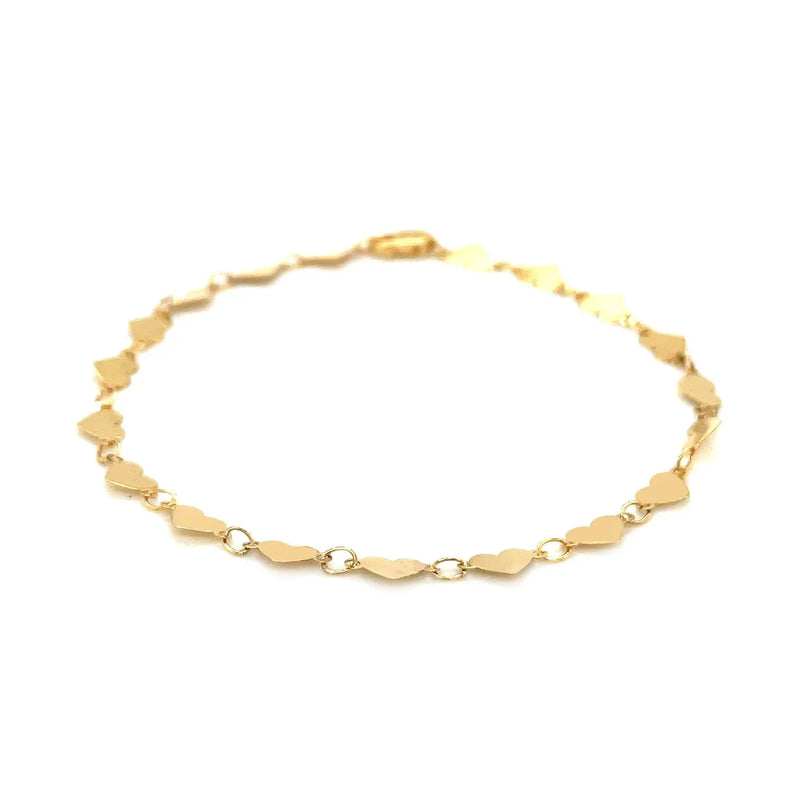 An image displaying 14k Yellow Gold 7 inch Mirrored Heart Chain Bracelet by Orca Market
