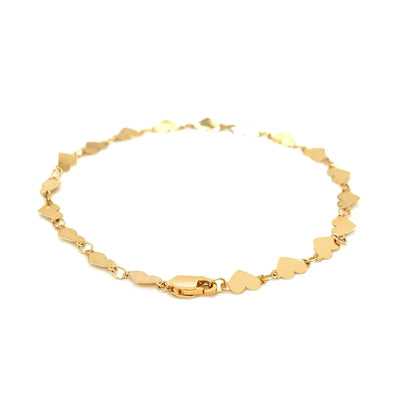 An image displaying 14k Yellow Gold 7 inch Mirrored Heart Chain Bracelet by Orca Market