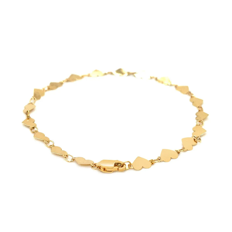 An image displaying 14k Yellow Gold 7 inch Mirrored Heart Chain Bracelet by Orca Market